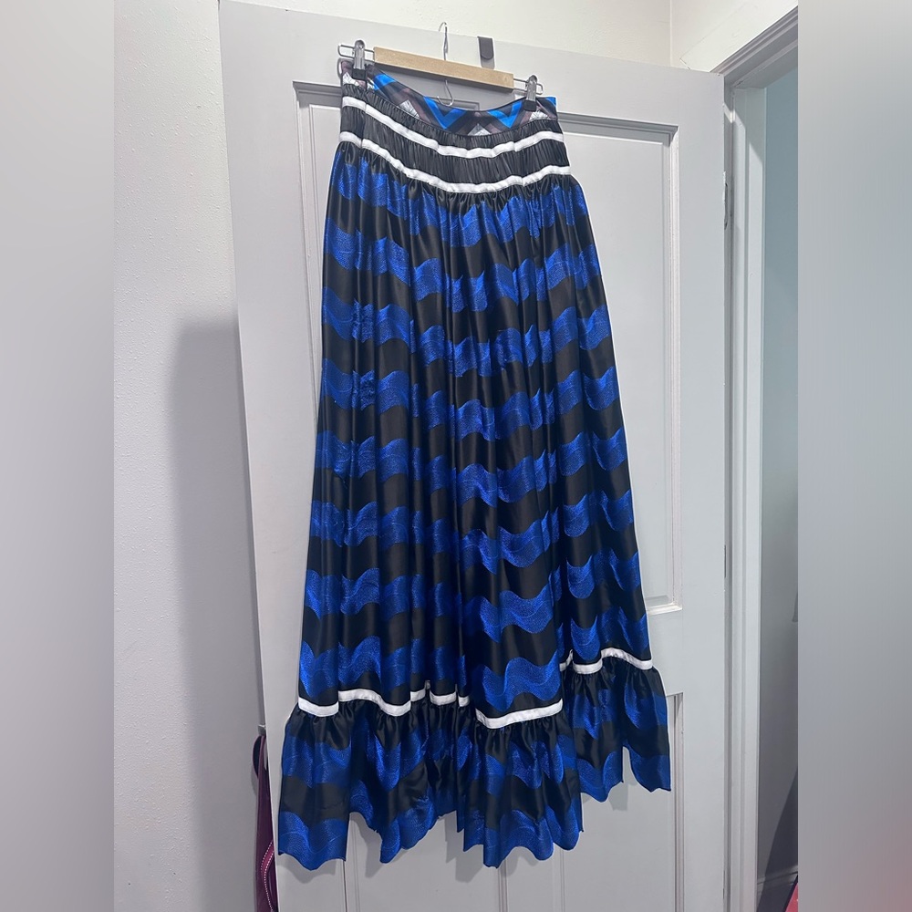 Blue and black maxi skirt with geometric detail.